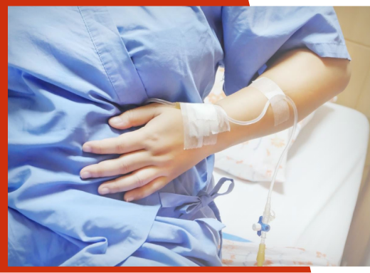 Patient holding his/her stomach